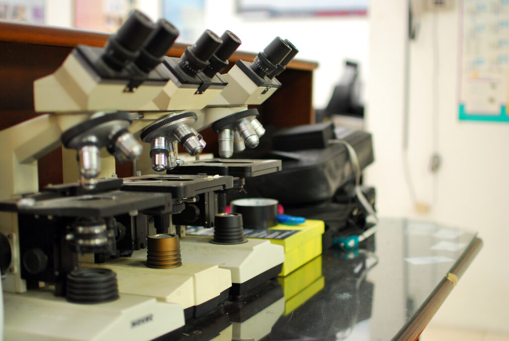Row of microscopes in a lab